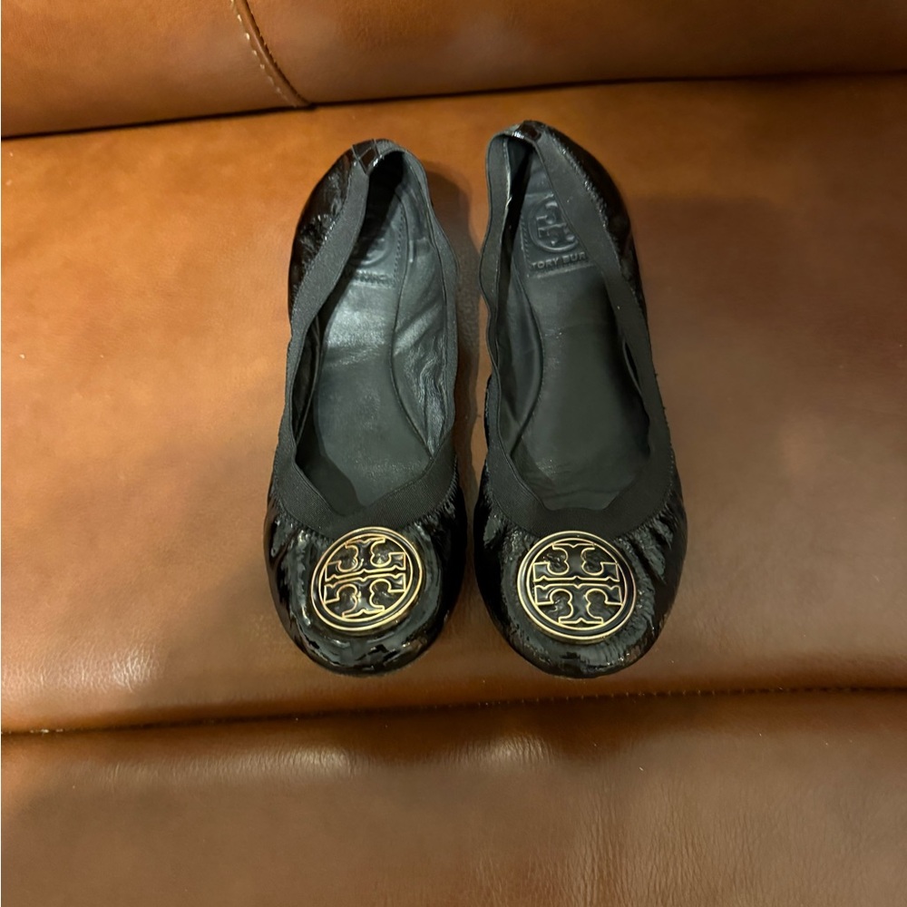 Tory Burch Black Flats with Gold Emblem